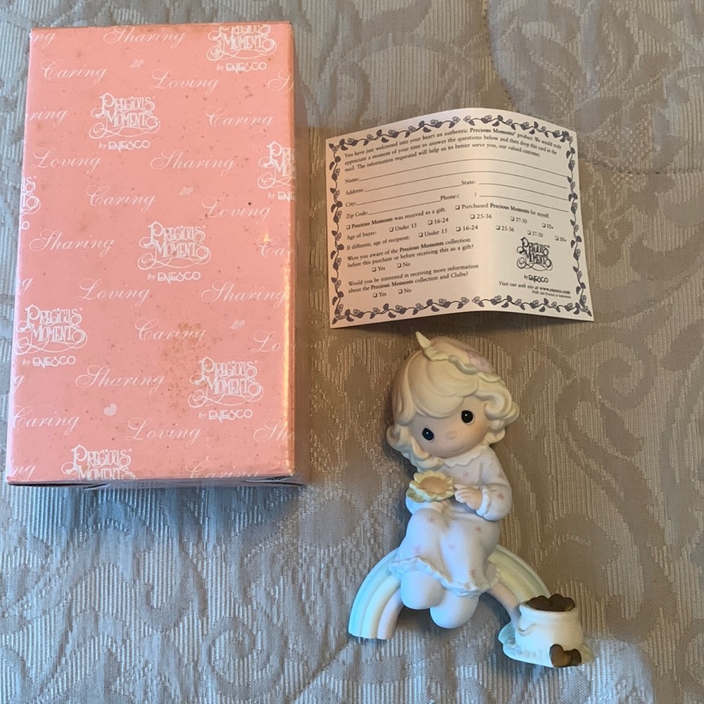 1994 Precious Moments porcelain figurine 128308 “Dreams Really Do Come True”